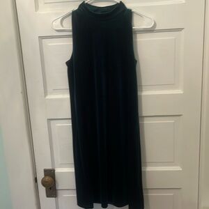 Emerald green dress in women’s size small. Fabric looks beautiful when it moves